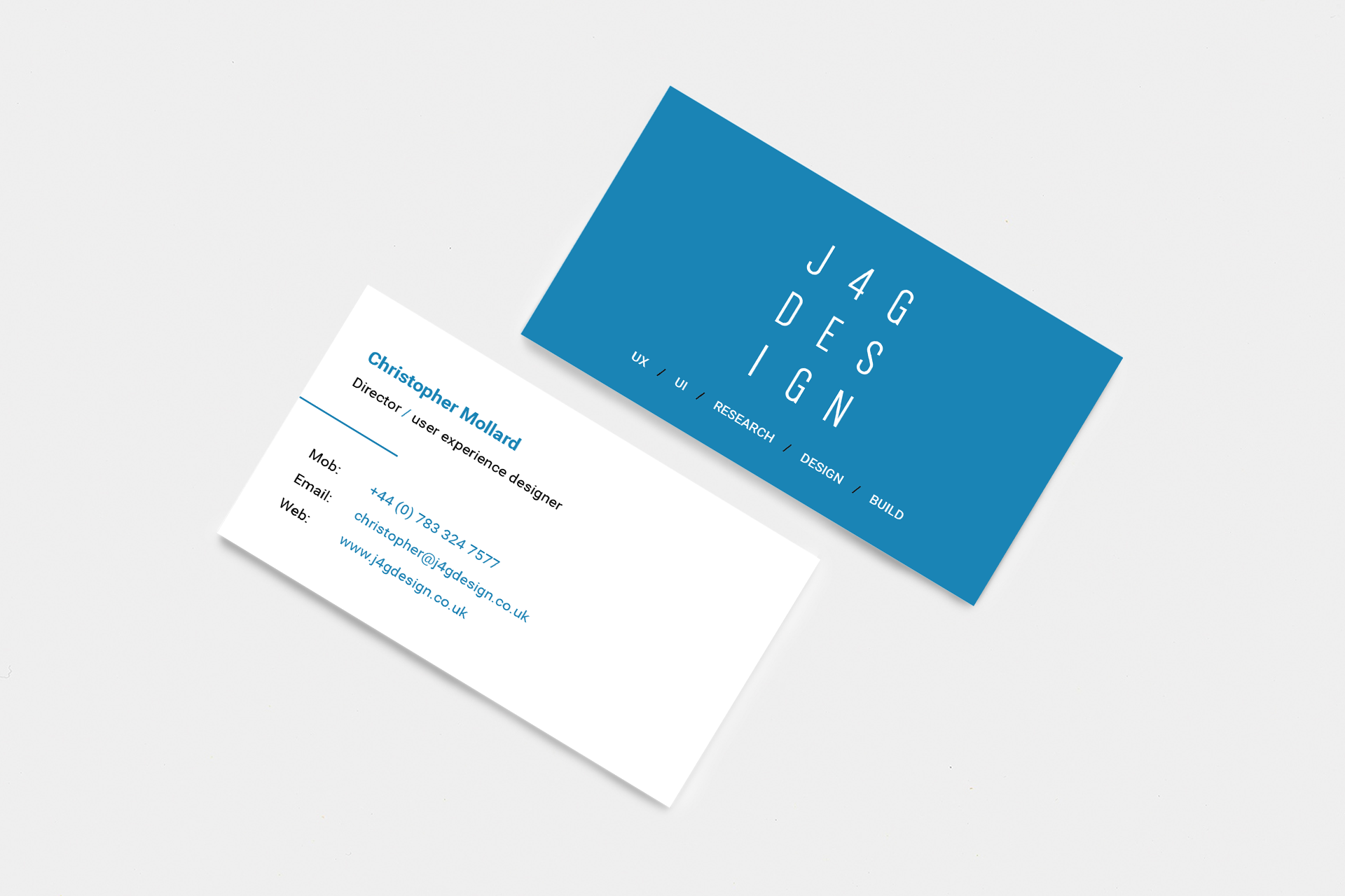 J4G Design business cards stacked showing front and back